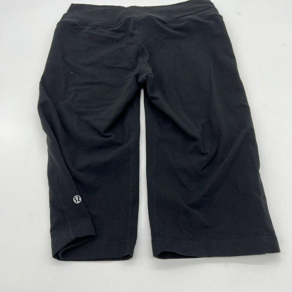 Lululemon Astro Pant Pleated Criss Cross Waist Flare Legging Black, Size 8 - Picture 3 of 5